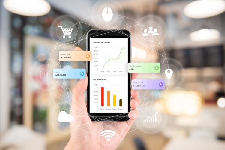 Handphone dengan tampilan aplikasi kasir